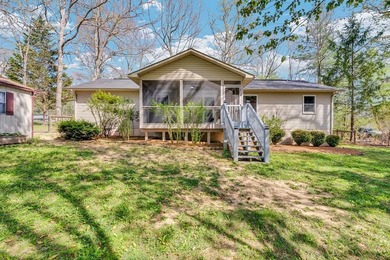 Charming 3BR/2BA home on a level lot just minutes from town in a - photo 7