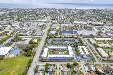 LOVELY EAST FACING UPDATED 2/2 second floor garden view unit in - photo 2