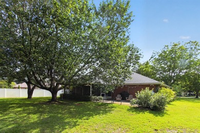 4-bedroom, 2-bath brick home offers comfort, space, and - photo 11