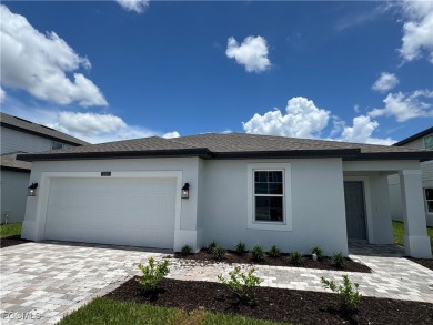 Lake Home For Sale in Lehigh Acres, Florida