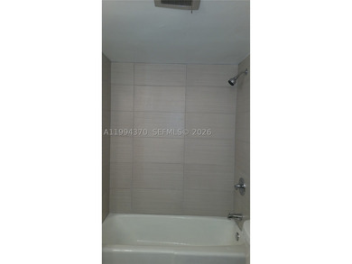 NEW IMPROVED PRICE. **Impact windows and slider thru-out this - photo 17