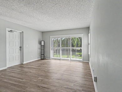 Welcome to Pine Ridge in Palm City! This beautifully maintained - photo 4