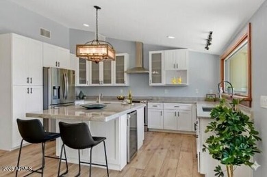 This 3-bed, 3-bath home was luxuriously updated in 2020 and is - photo 3