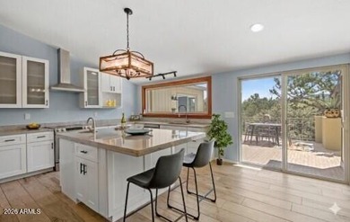 This 3-bed, 3-bath home was luxuriously updated in 2020 and is - photo 5