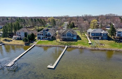 Welcome to the epitome of lakeside living on the shores of - photo 7