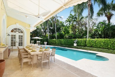 This British Colonial residence offers 6,922+/- total square - photo 3