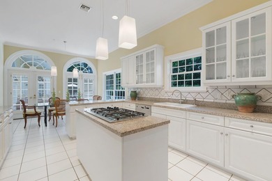 This British Colonial residence offers 6,922+/- total square - photo 10