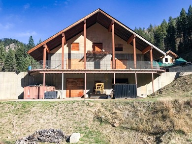 This listing includes a 4-story lodge and a 3-story garage with - photo 5
