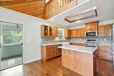 Find lakefront bliss in this charming & spacious home that sits - photo 14