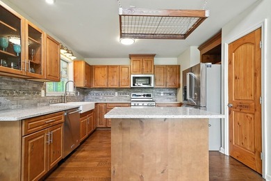 Find lakefront bliss in this charming & spacious home that sits - photo 15