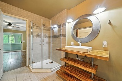 Find lakefront bliss in this charming & spacious home that sits - photo 21