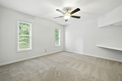Find lakefront bliss in this charming & spacious home that sits - photo 29