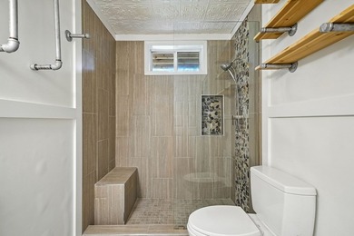 Find lakefront bliss in this charming & spacious home that sits - photo 36
