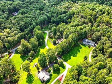 Find lakefront bliss in this charming & spacious home that sits - photo 42
