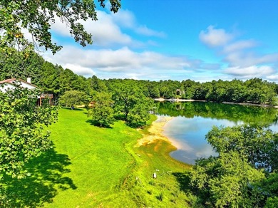 Find lakefront bliss in this charming & spacious home that sits - photo 49