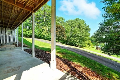 Find lakefront bliss in this charming & spacious home that sits - photo 50