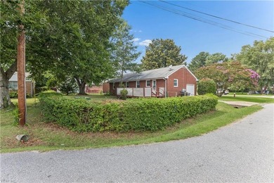 This beautifully maintained brick rancher offers 3 bedrooms/1.5 - photo 2
