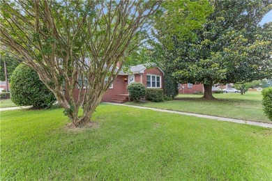 This beautifully maintained brick rancher offers 3 bedrooms/1.5 - photo 3