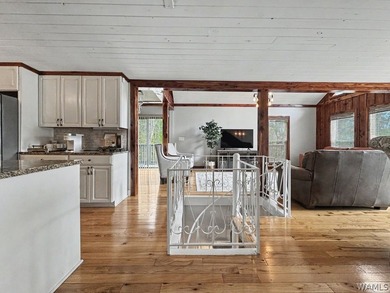 Experience the beauty of Lake Tuscaloosa at this delightful - photo 12