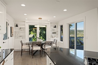 Perched above Lake Washington in one of the Island's most - photo 15