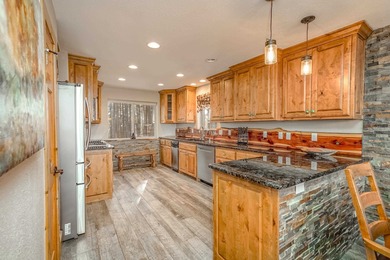 Incredibly beautiful custom home located on the highly manicured - photo 15