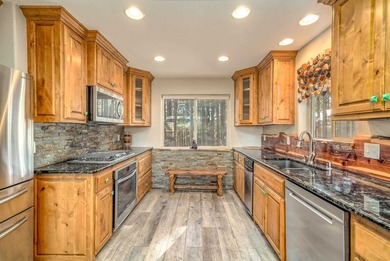 Incredibly beautiful custom home located on the highly manicured - photo 16