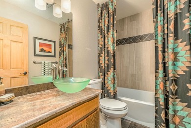 Incredibly beautiful custom home located on the highly manicured - photo 19