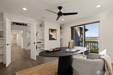 Perched above Lake Washington in one of the Island's most - photo 24
