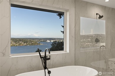 Perched above Lake Washington in one of the Island's most - photo 32