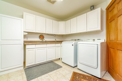 Incredibly beautiful custom home located on the highly manicured - photo 42