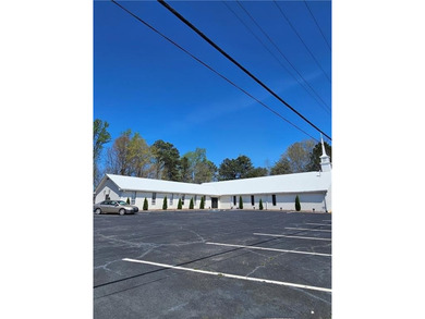 Prime redevelopment opportunity at a signalized, high-traffic - photo 1