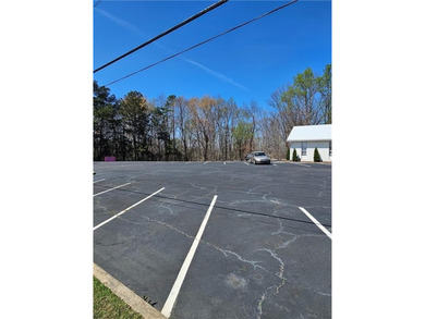 Prime redevelopment opportunity at a signalized, high-traffic - photo 2