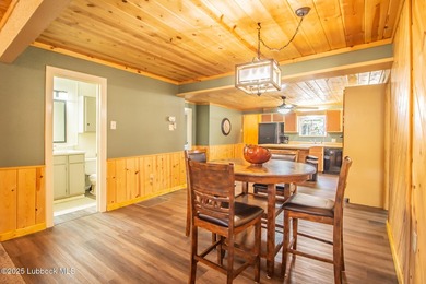 Peaceful lake living meets timeless character in this inviting - photo 12