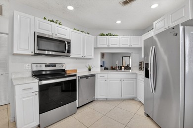 This beautifully renovated 3-bedroom, 2-bath home is tucked away - photo 13