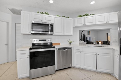 This beautifully renovated 3-bedroom, 2-bath home is tucked away - photo 14