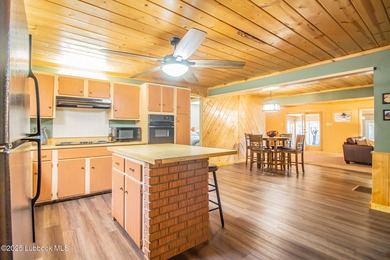 Peaceful lake living meets timeless character in this inviting - photo 15