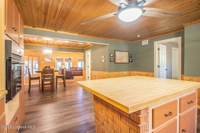 Peaceful lake living meets timeless character in this inviting - photo 17