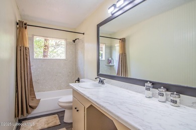 Peaceful lake living meets timeless character in this inviting - photo 22
