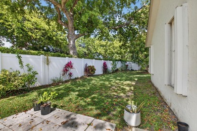 This beautifully renovated 3-bedroom, 2-bath home is tucked away - photo 30