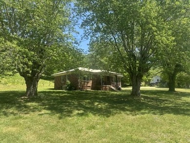 Nice 3 BR 1BH brick home with full size basement on 9.67 acres - photo 1