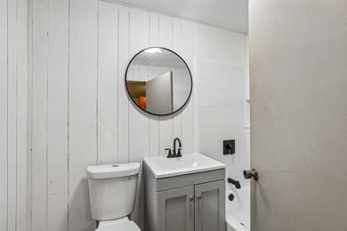 Discover an unparalleled Chain of Lakes lakefront retreat, with - photo 18