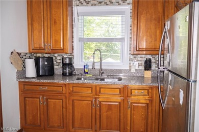 2nd floor unit features updated kitchen with beautiful wood - photo 19