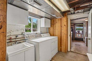 Discover an unparalleled Chain of Lakes lakefront retreat, with - photo 27