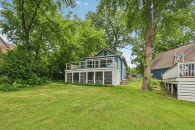 Discover an unparalleled Chain of Lakes lakefront retreat, with - photo 30