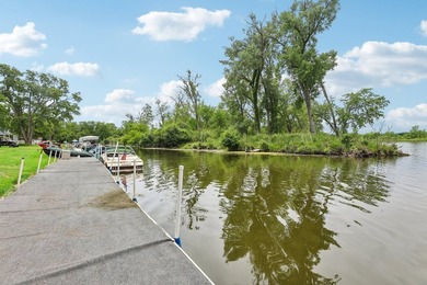 Discover an unparalleled Chain of Lakes lakefront retreat, with - photo 33