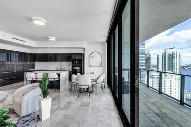 This high-floor corner residence at Echo Brickell offers 1,625