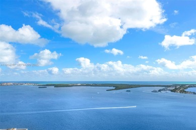 This high-floor corner residence at Echo Brickell offers 1,625