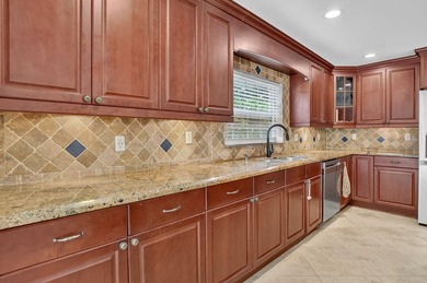 Welcome to this beautifully maintained lakefront home nestled in - photo 8