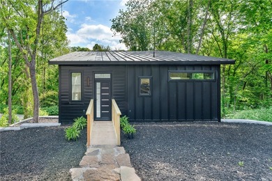 Experience modern lakeside living in Springdale with this newly - photo 1