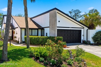 Welcome to 2543 Dauphine Ct E, an elegant 3BR/2BA lakefront - photo 3